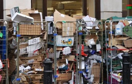 trolly full of folded cardboard waste in retail shop 768x684retail & f&b outlets trolly full of folded cardboard waste in retail shop 768x684retail & f&b outlets